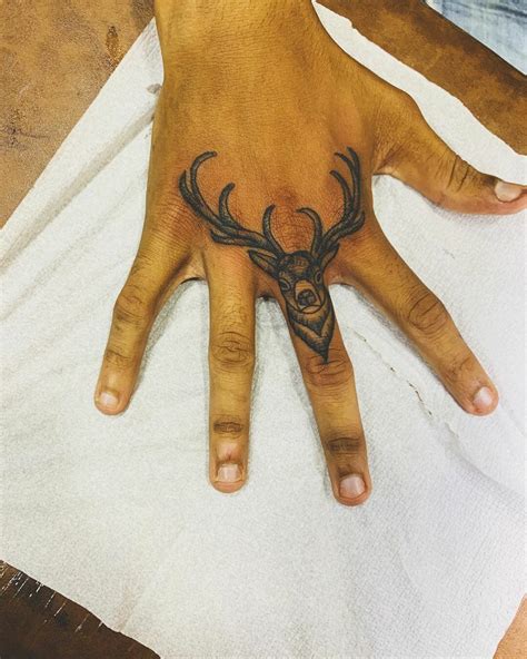 deer tattoo on hand|realistic deer tattoos.